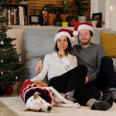 Paloma Kwiatkowski and Curtis Tweedie with their dog Daisy. 